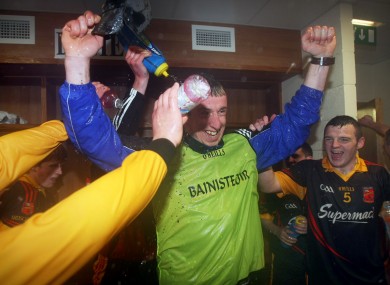 Niall Moran is sprayed with water by Ard Scoil Rís players in the dressing room after the 2011 Dr Harty Cup final