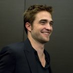 Robert Pattinson's appearance at number 10 rounds off the trio of Twilight stars who appeared in this Forbes list. He hasn't had much luck in his love life of late, but he did earn .5 million. Not enough to mend a broken heart, but enough to allow him to stay glued to his couch eating take-aways for a few months. (AP Photo/The Canadian Press, Chris Young)