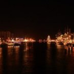The ships all lit up at night. Photo by @lainkeyk.
