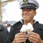 A sailor from the Mexican ship 'Cuauhtemoc' enjoys some ice cream during race stopover in Dublin. (Julien Behal/PA Wire)