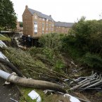 Water still cascades through the flats at Newburn in Newcastle after heavy flooding this week. It is reported they will collapse or have to be demolished. Image: Owen Humphreys