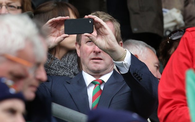 Enda Kenny records the scene on his phone 23/9/2012