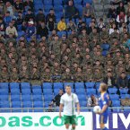 Kazakh soldiers watch Simon Cox. ©INPHO/Lorraine O'Sullivan.