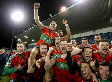 Ballymun Kickhams' players celebrate after the game.