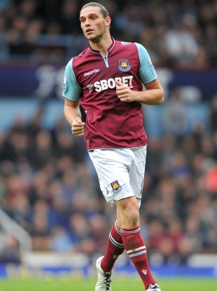Andy Carroll should get more protection from referees according to his coach.