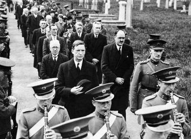Taoiseach Eamon De Valera, who would later dismiss soldiers for desertion, and his cabinet with Irish soldiers in 1938.