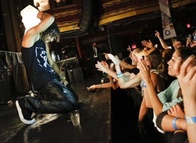 Lupe Fiasco performing in October 2012.