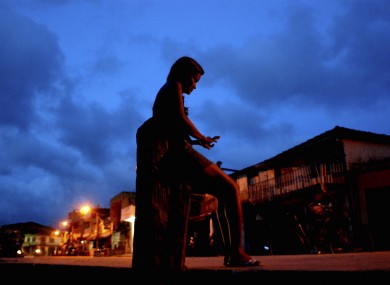 File picture: A prostitute waits for clients at a street in Abaetetuba, Brazil.