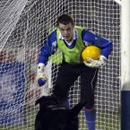 The Monaghan goalkeeper faces off with an intruder to his goalmouth.