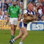 On route to winning a Munster hurling medal and shooting 0-3, John Mullane found time in Thurles to clear the pitch of a canine invasion.