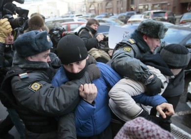 Police detain supporters of a bill banning