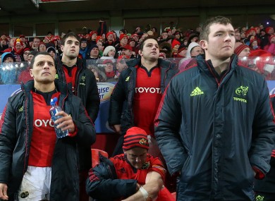 Doug Howlett and Peter O'Mahony watch Munster v Ulster in December.