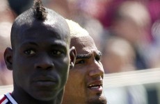 Mario Balotelli tries to hit a guy on a golf cart with a football