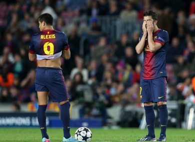 Barcelona's Alexis Sanchez and David Villa stand dejected after Bayern Munich's third goal.