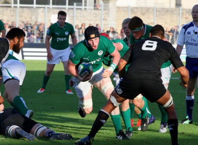 Ireland's John Donnan on the charge.