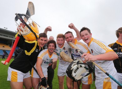 Antrim players celebrate at the final whistle last Saturday.