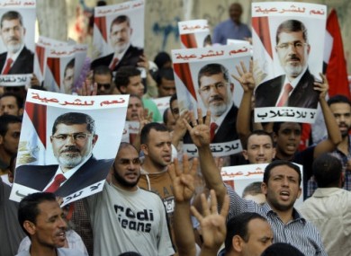 Mohammed Morsi supporters in Cairo yesterday