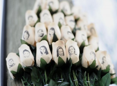 Roses printed with the faces of victims of the Sandy Hook school massacre near the school earlier this year.