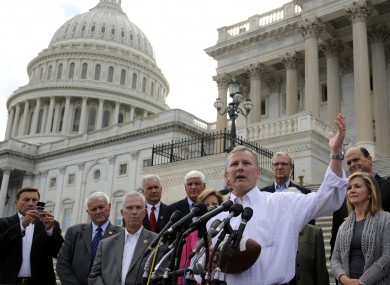 Rep. Tim Griffin, R-Ar., right, joins other Republican House Members as they call on Senate Democrats to