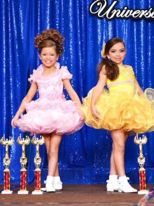 Children participating in a Universal Royalty Pageant.