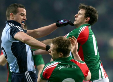 Dublin's Ger Brennan clashes with Donal Vaughan of Mayo and is sent off.