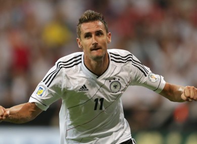 Germany's Miroslav Klose celebrates after scoring his side's opening goal tonight.