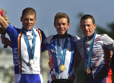 Gold medallist Viacheslav Ekimov of Russia, centre, with silver medal winner Jan Ullrich, left, and Armstrong.