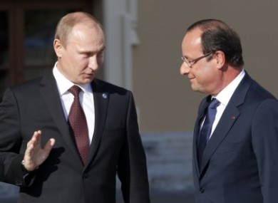 Russia's President Vladimir Putin with French President Francois Hollande at the Konstantin Palace in St. Petersburg.