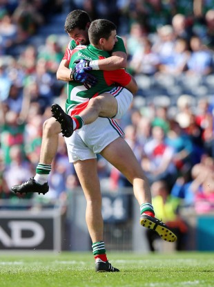 Tommy Conroy of Mayo celebrates scoring the first goal of the game with Padraig Prendergast.