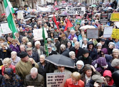 Thousands of protesters gathered outside the Dáil this week in opposition to the cuts in Budget 2014.