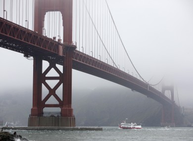 The Golden Gate Bridge in fog.
