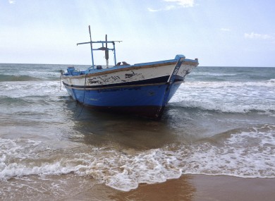 File photo off a migrant boat of Sicily last month.