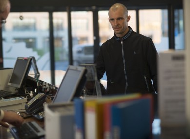 Nidge checks into a hotel, in a newly-released still from Sunday's episode