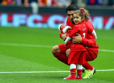 Family man: Liverpool's Luis Suarez.