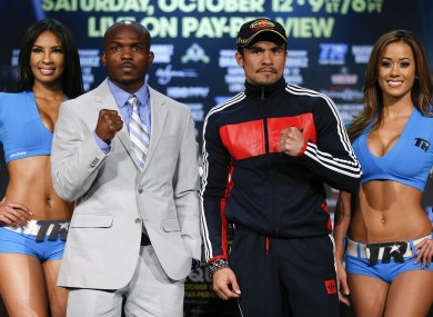 Timothy Bradley, second from left, and Juan Manuel Marquez pose for photos after a news conference in Las Vegas. The two boxers meet Saturday for Bradley's WBO welterweight title.